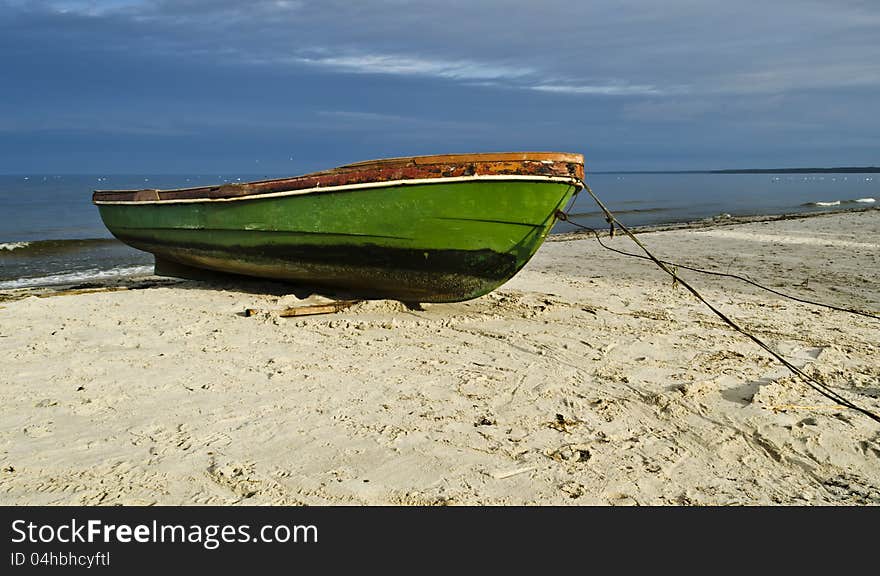 Fishing boat on sandy beach, Latvia, Europe