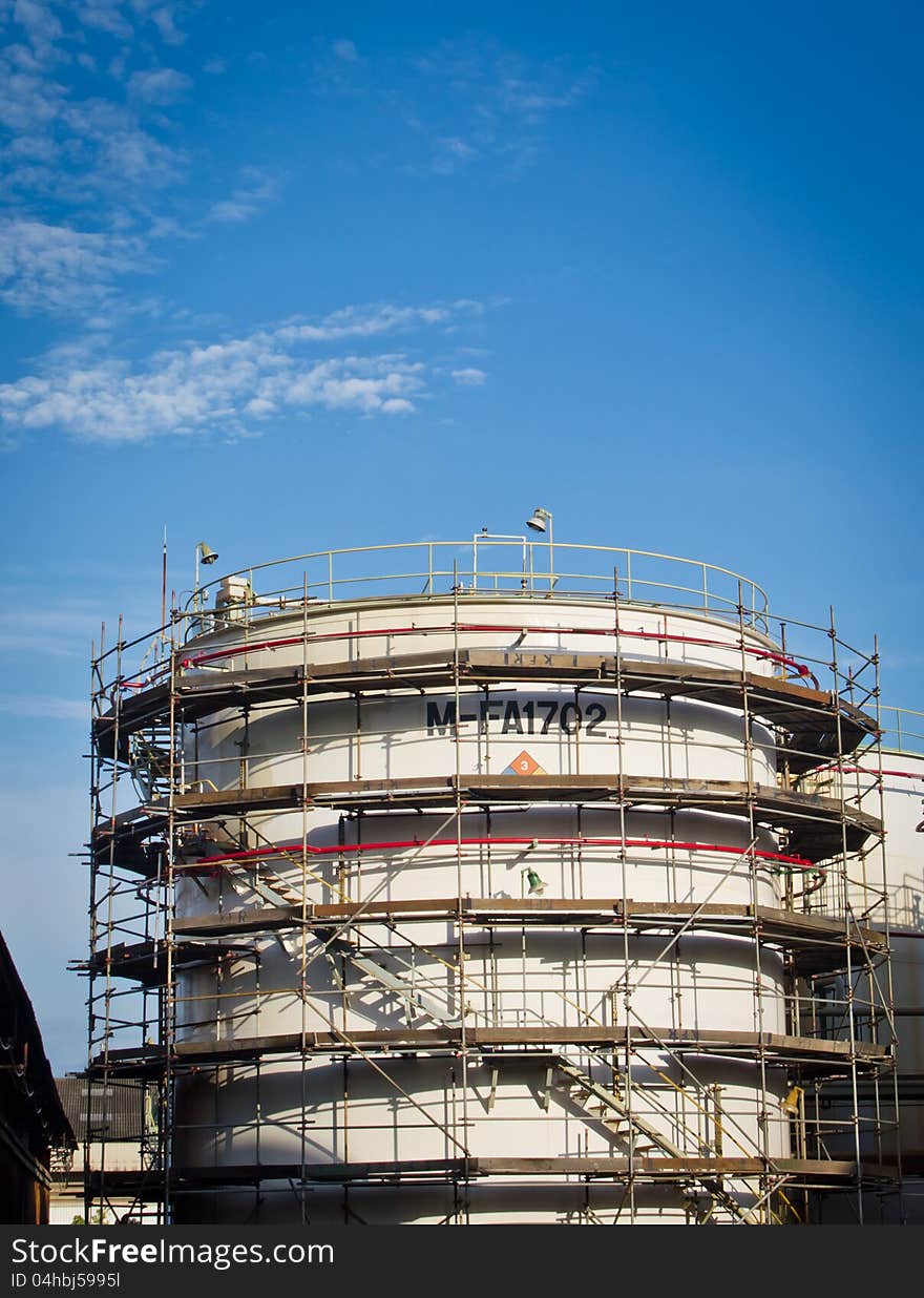 Fuel tank among maintenance in blue sky day