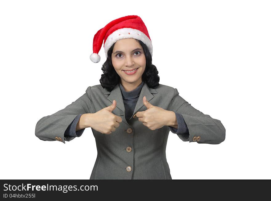 Mixed race business woman wearing santa hat, show her thumb isolated over white background. Mixed race business woman wearing santa hat, show her thumb isolated over white background