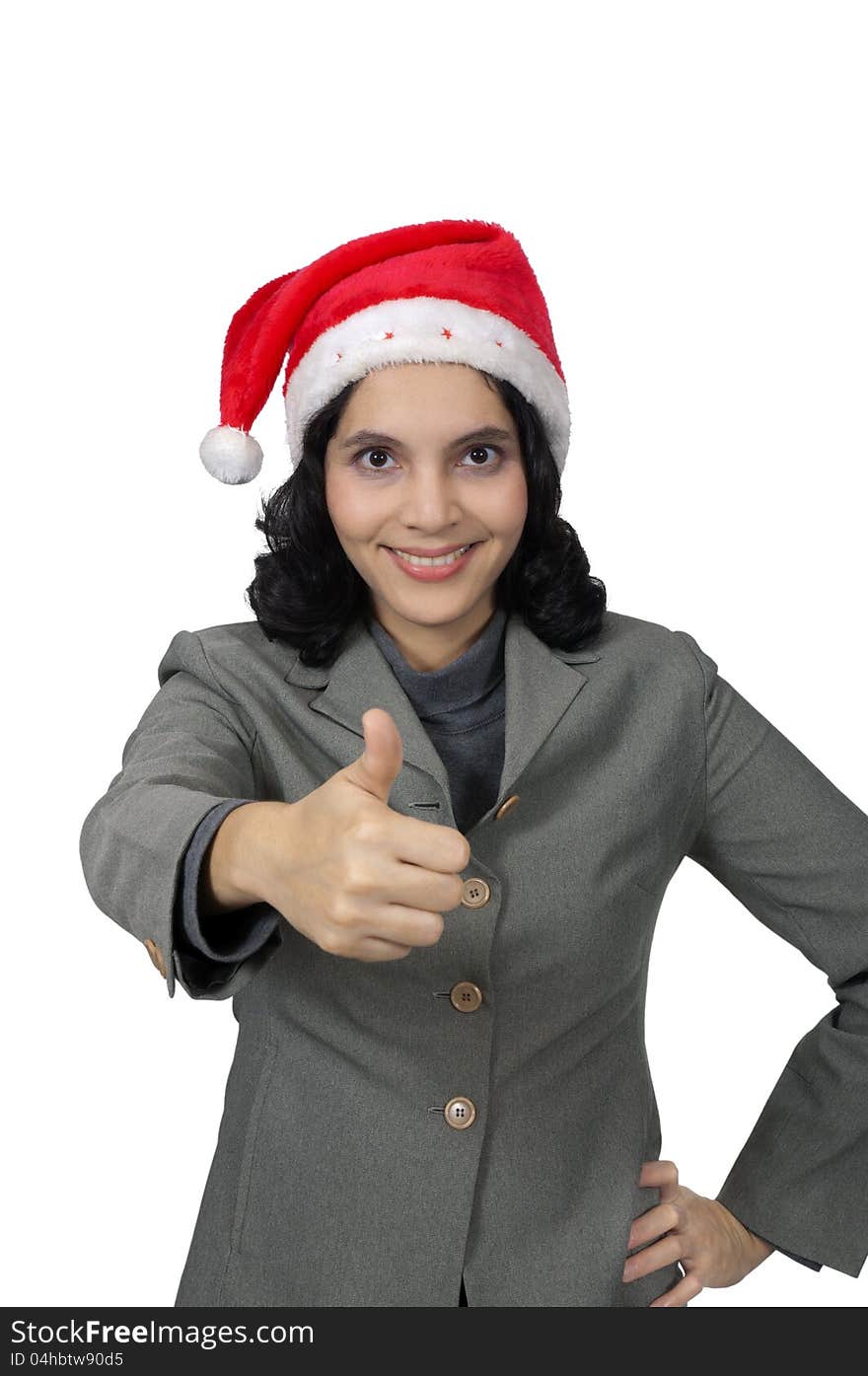 Mixed race business woman wearing santa hat, show her thumb isolated over white background. Mixed race business woman wearing santa hat, show her thumb isolated over white background