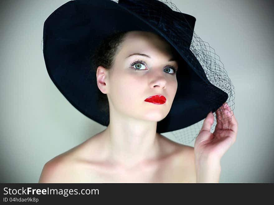 Fashion girl in retro hat. Fashion girl in retro hat