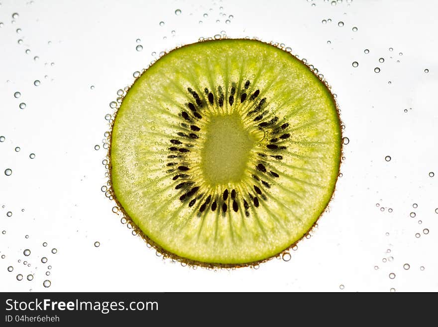 Kiwi Fruit Floating In Soda Water