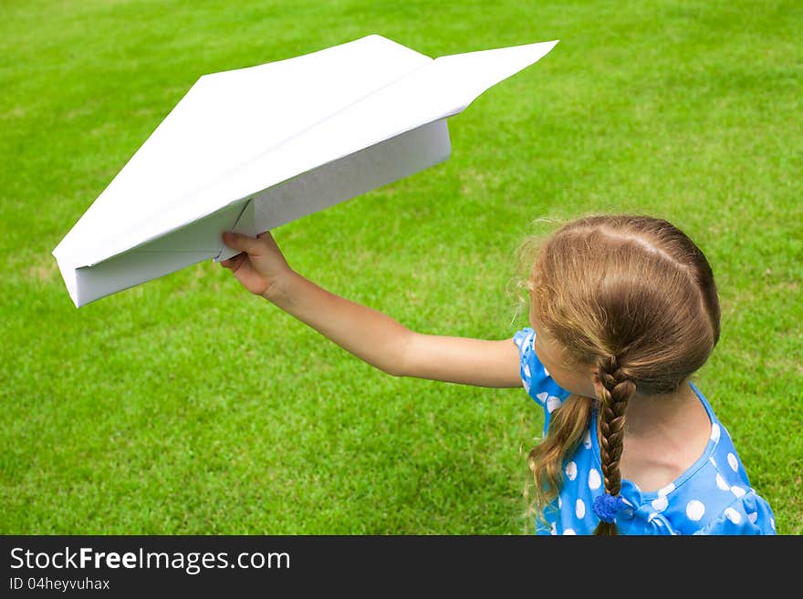 Airplane in the hand of child.