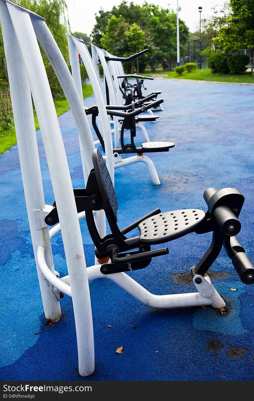 Fitness equipments on playground in a public sports park.