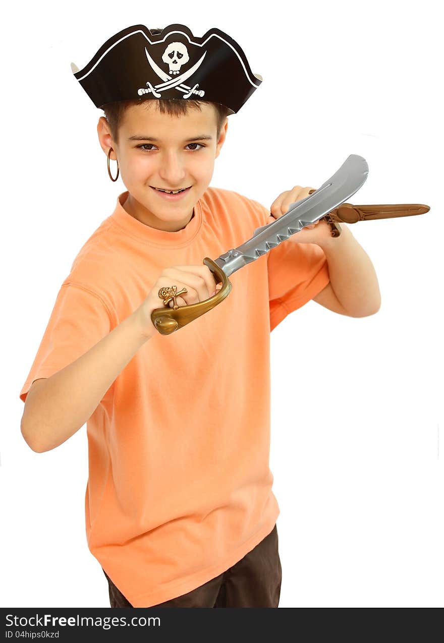 A boy dressed as a pirate with hat and boots and weapons toy in his hand isolated on a white background close up shot