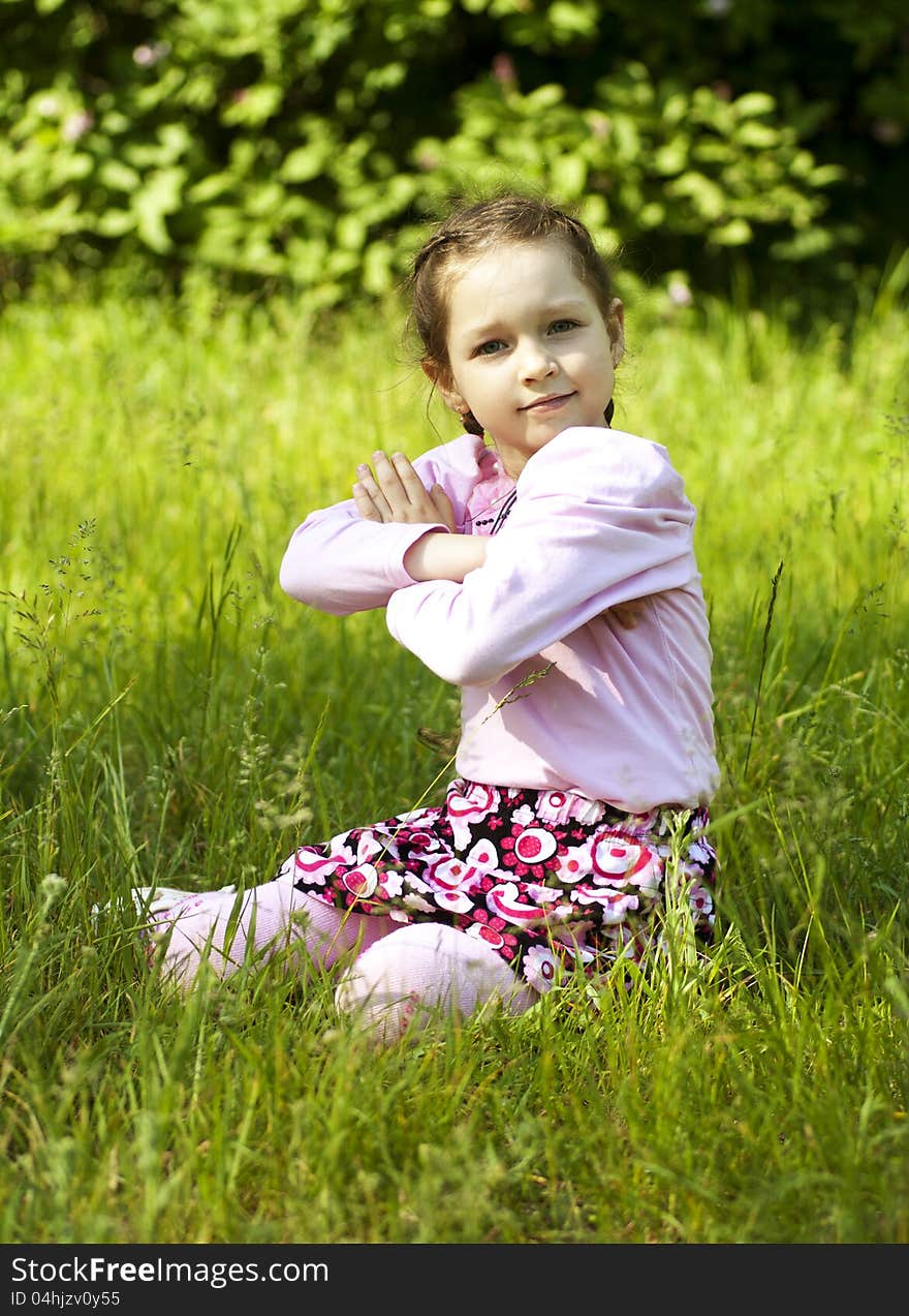 Little funny girl in park, seeting, summer image. Little funny girl in park, seeting, summer image