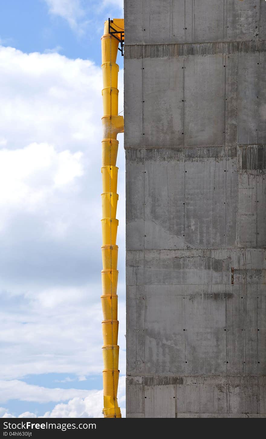 Building refuse.Temporary suspension barrel to remove debris.