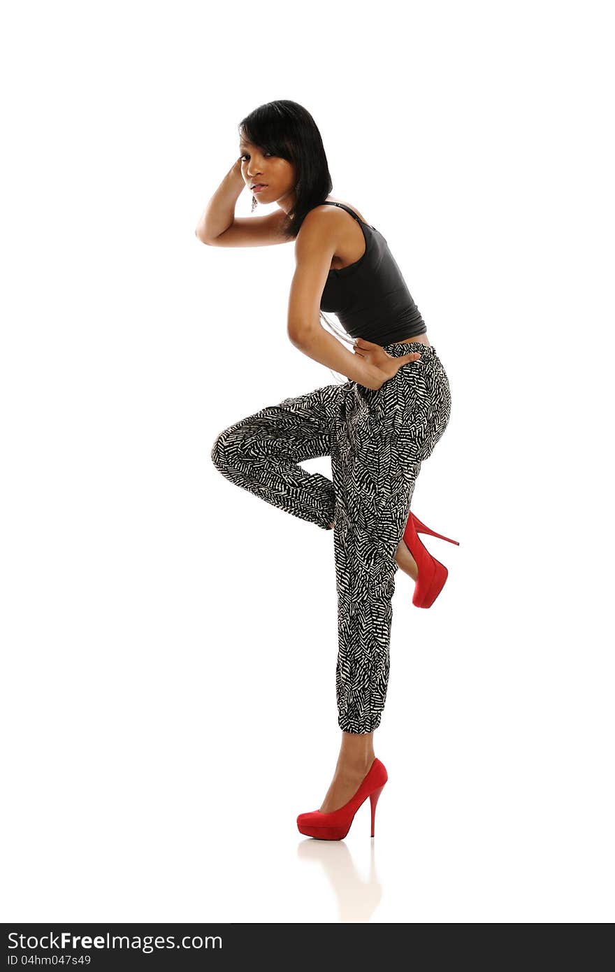 Young African American woman posing isolated on a white background