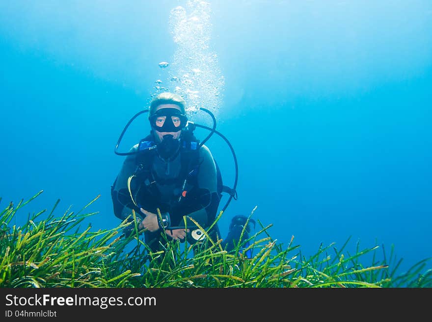 Female Scuba Diver relaxing during a dive