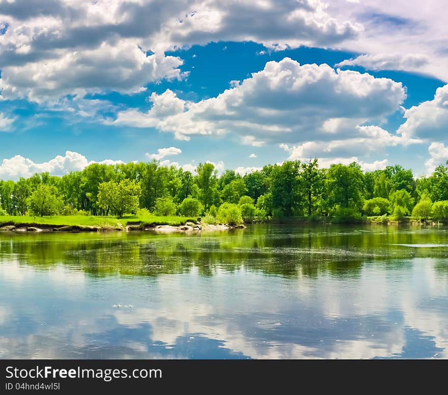 Clouds Reflection On Lake.