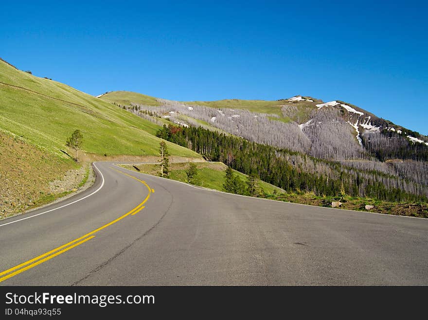 Mountain highway with blue sky. Mountain highway with blue sky