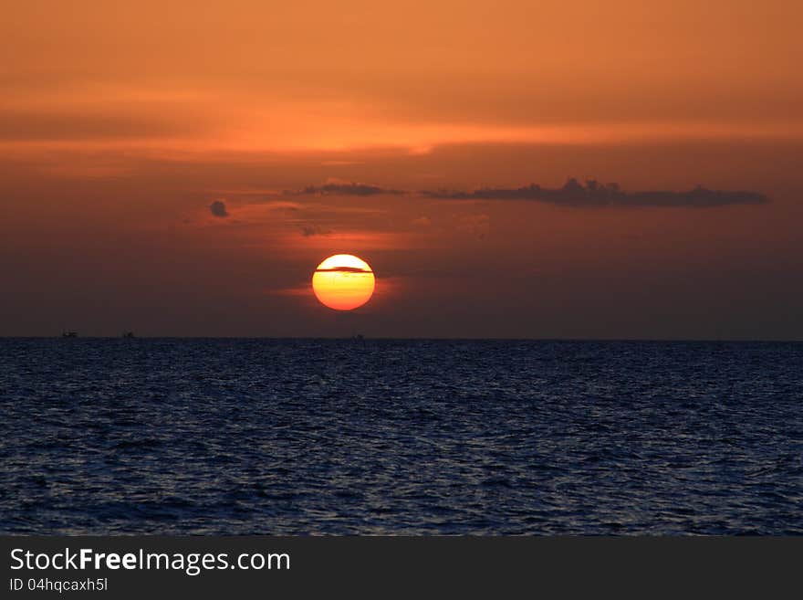 Sunset and orange light with blue sea. Sunset and orange light with blue sea