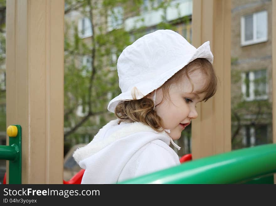 Beautiful little girl at playground