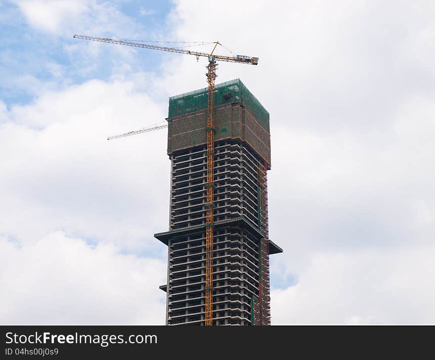 Buildings under construction with cranes