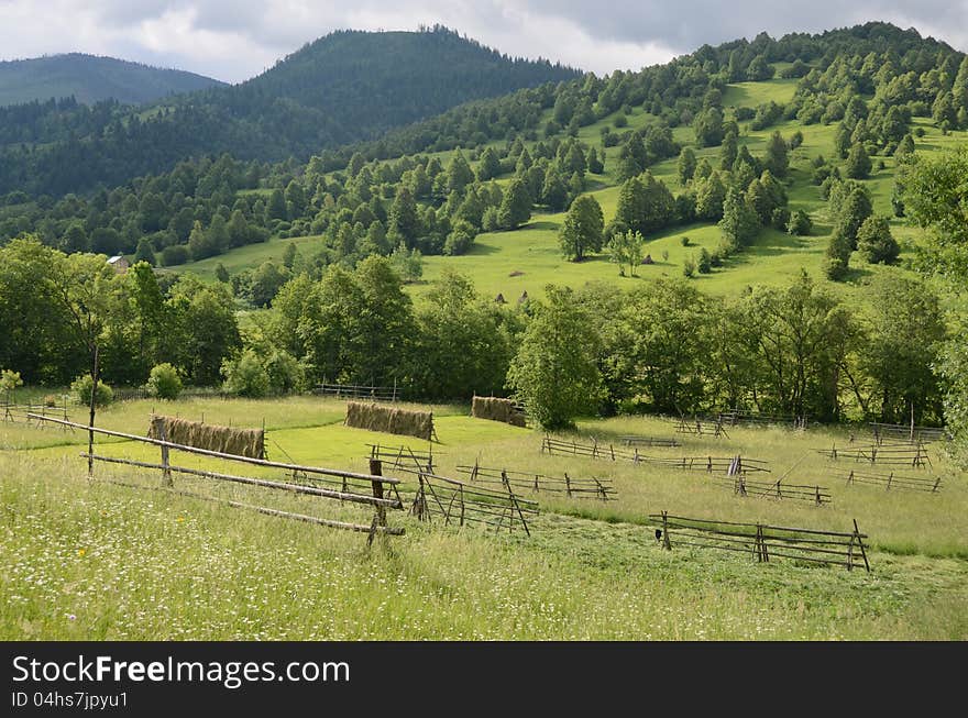 Hill landscape with hay support in Transylvania land of Romania. Hill landscape with hay support in Transylvania land of Romania