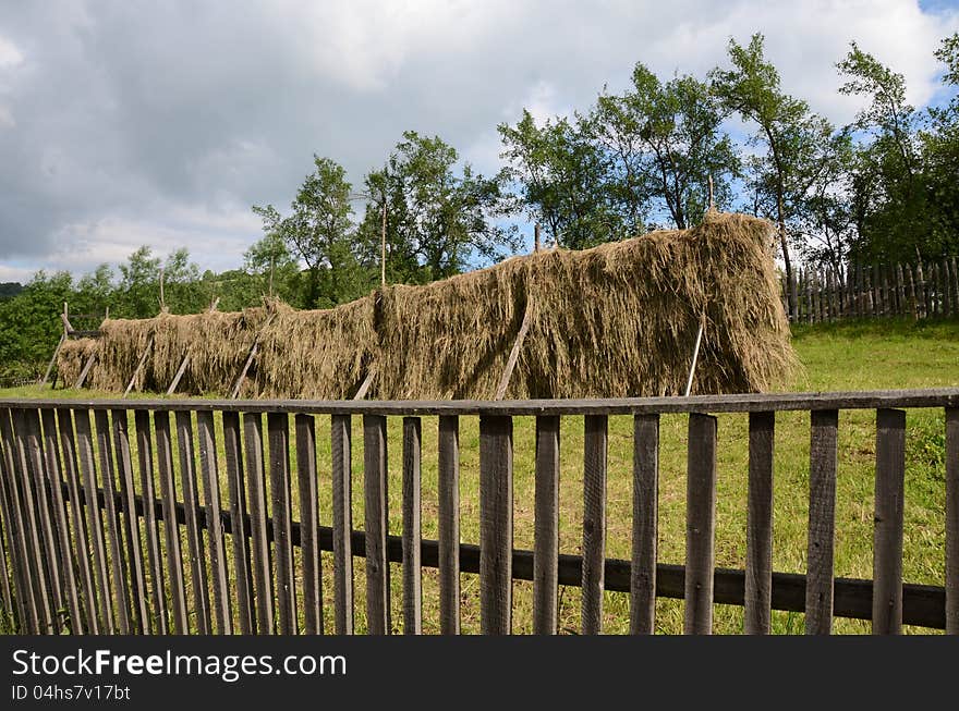 Wooden fence hay