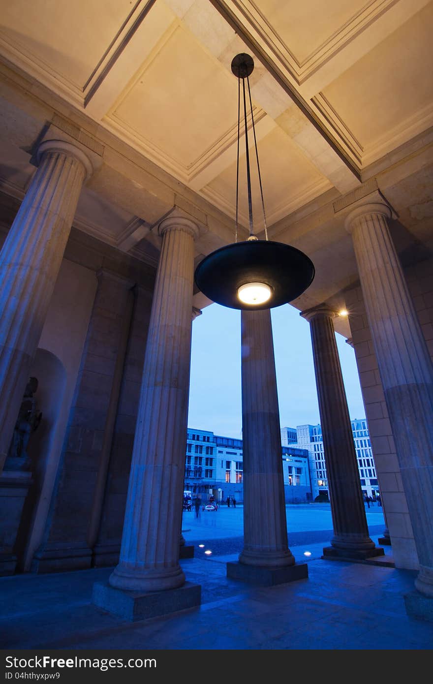 Under the Brandenburger Gate in Berlin, Germany, seen at twilight