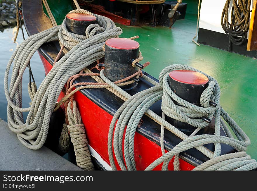 Sea knot and ropes on a ships deck at Lelystad harbour in The Netherlands. The harbour is called Bataviahaven. Sea knot and ropes on a ships deck at Lelystad harbour in The Netherlands. The harbour is called Bataviahaven.