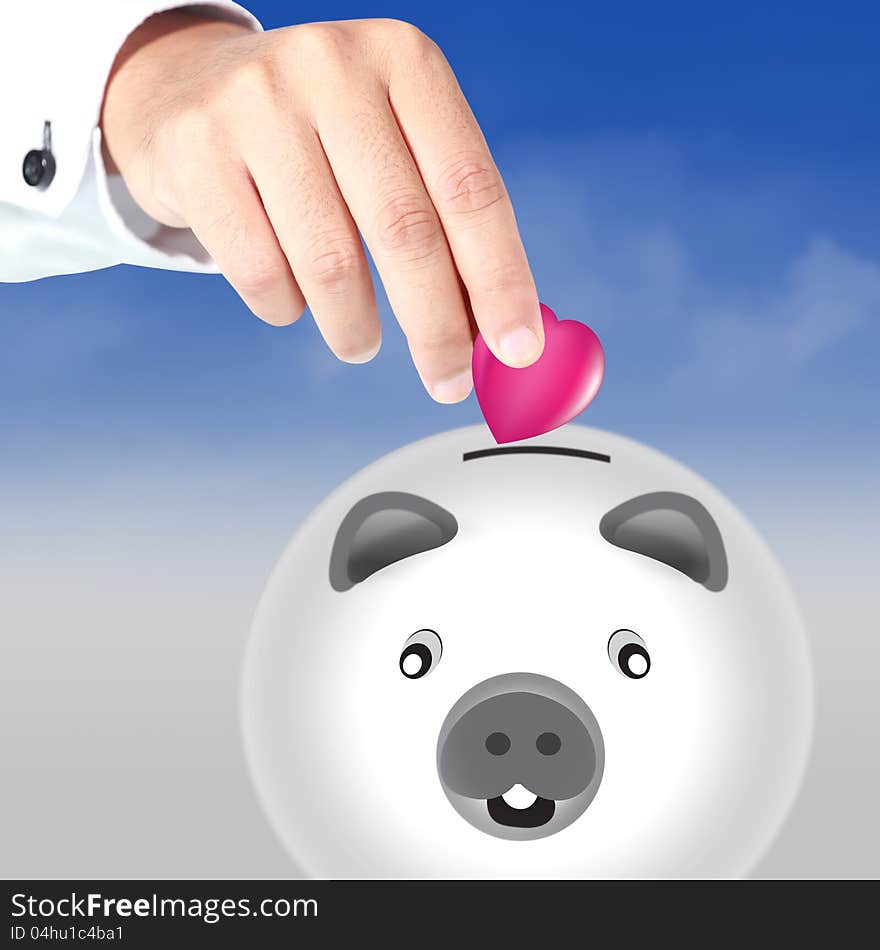 Hand drops Pink heart in the piggy bank, the concept of loving care. Hand drops Pink heart in the piggy bank, the concept of loving care