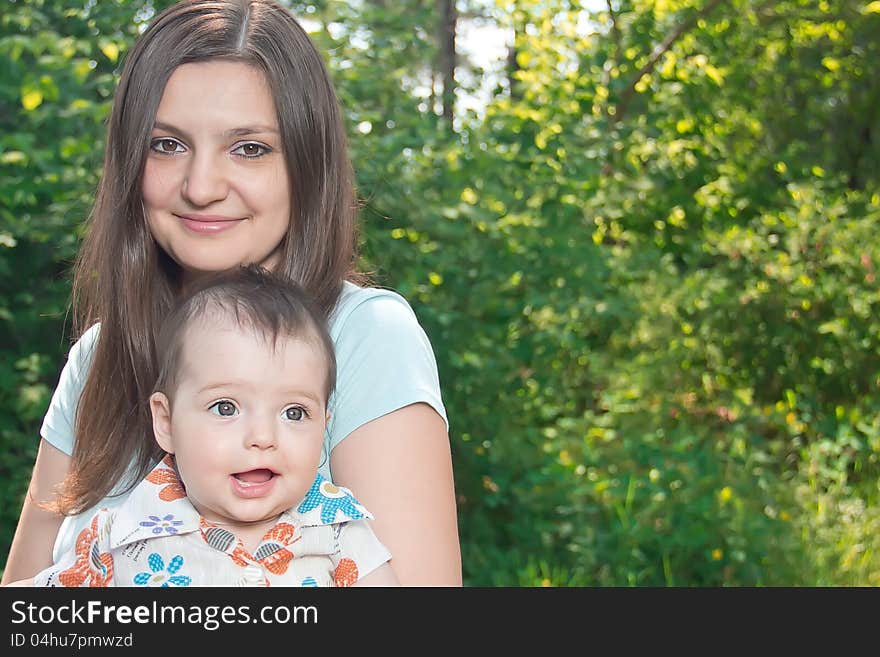 Portrait of mother and child in nature. Portrait of mother and child in nature