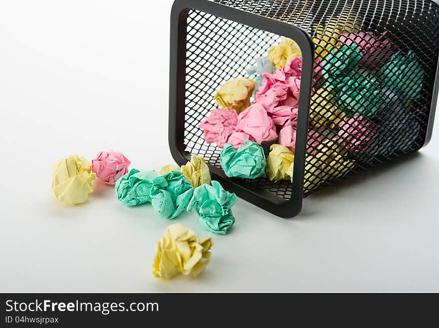 Garbage bin with paper waste