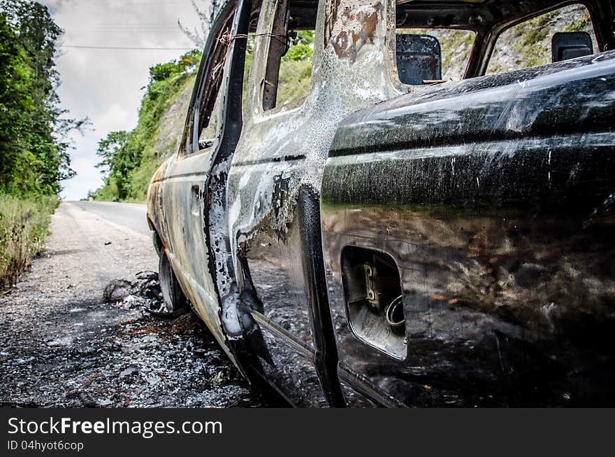 Car burned out from overheating trying to climb steep hill. Car burned out from overheating trying to climb steep hill