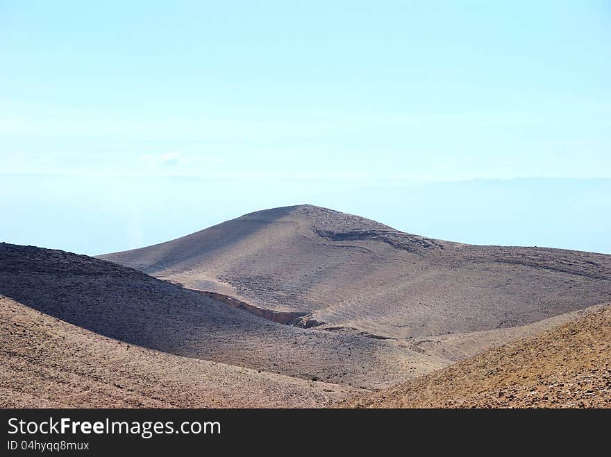 Fragment of ancient desert under blue sky. Desert Negev, Israel.