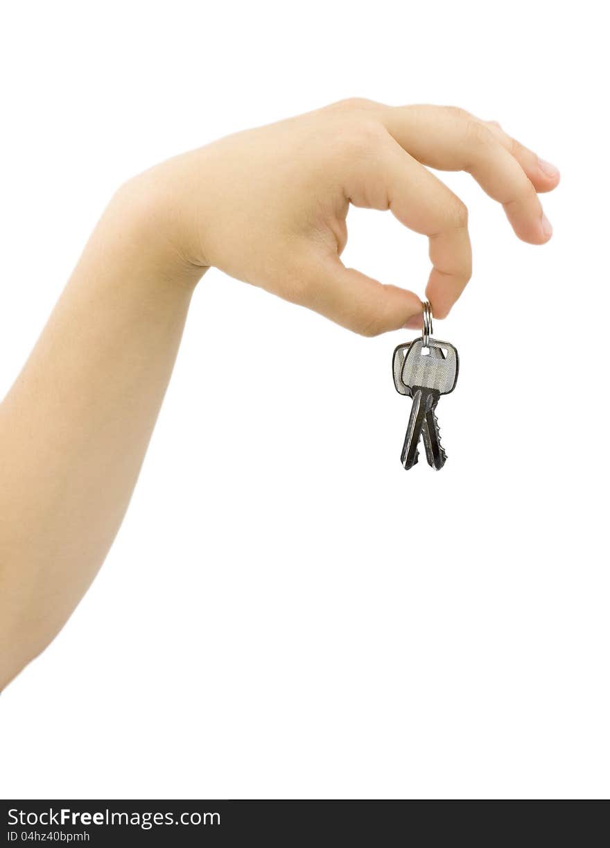 Hand holding bunch of keys isolated on white