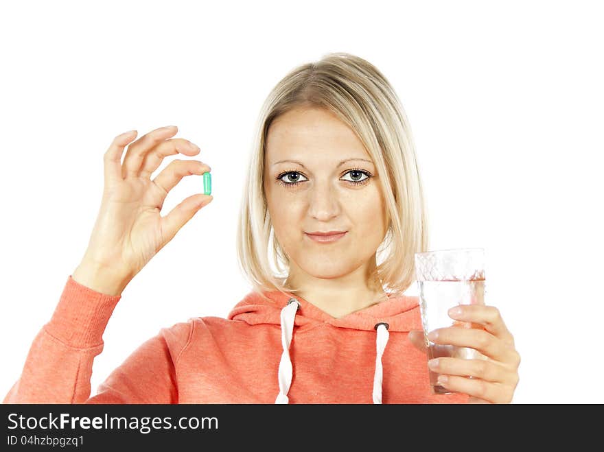 Beautiful girl with medication and water