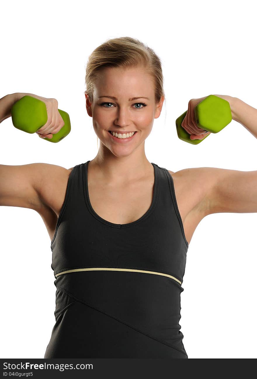 Young Blond Woman working out with dumbbells on a white background. Young Blond Woman working out with dumbbells on a white background