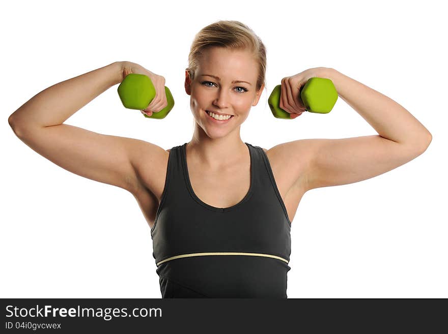 Young Blond Woman working out with dumbbells on a white background. Young Blond Woman working out with dumbbells on a white background