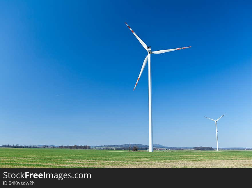 Wind turbine farm, alternative energy on green field. Wind turbine farm, alternative energy on green field