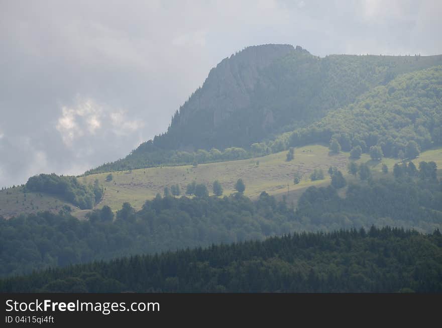 Rooster Ridge is a protected area of national interest in Romania (a composite nature reserve), located in the Gutai Mountains, county administrative territory of the commune Deseşti, Mara village, about 30 km north to the towns of Baia Mare and Baia Sprie in Maramures county.