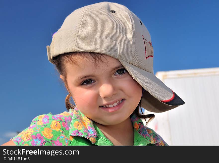 Portrait Of A Girl In A Baseball Cap