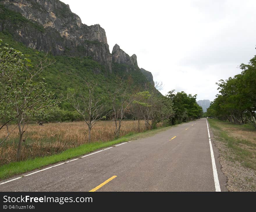 A beautiful road along with mountain.