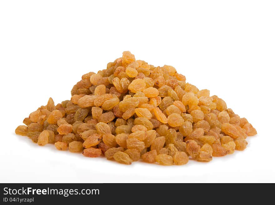 Pile of raisins or black currant on a white background