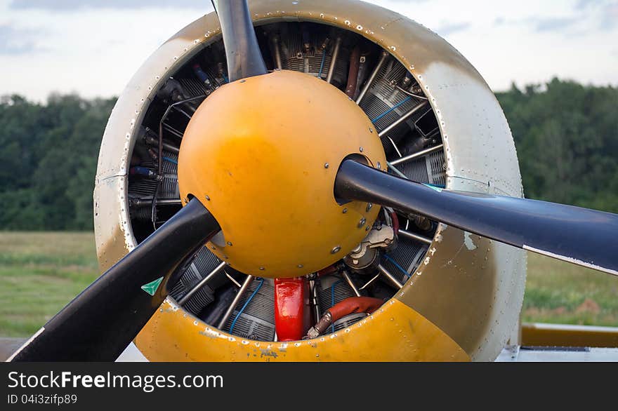 Airplane engine with propeller closeup view.