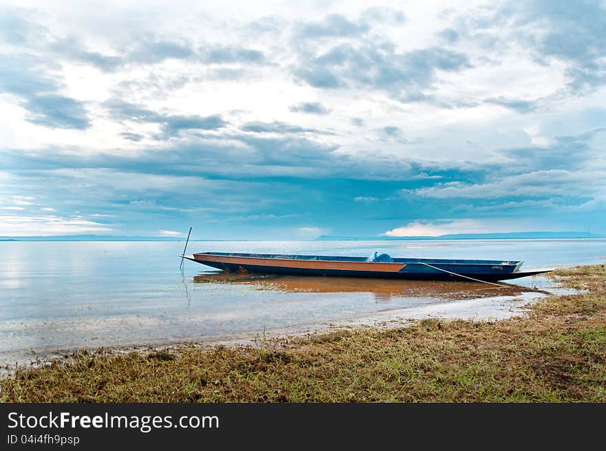 A ship anchoring on the lake shore in Northeaster Thailand. A ship anchoring on the lake shore in Northeaster Thailand.