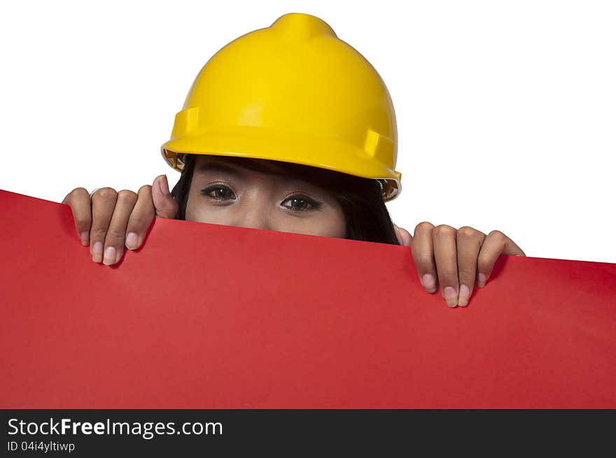 Asian woman architect wearing yellow helmet holding red banner. You can put your message on the banner. Asian woman architect wearing yellow helmet holding red banner. You can put your message on the banner