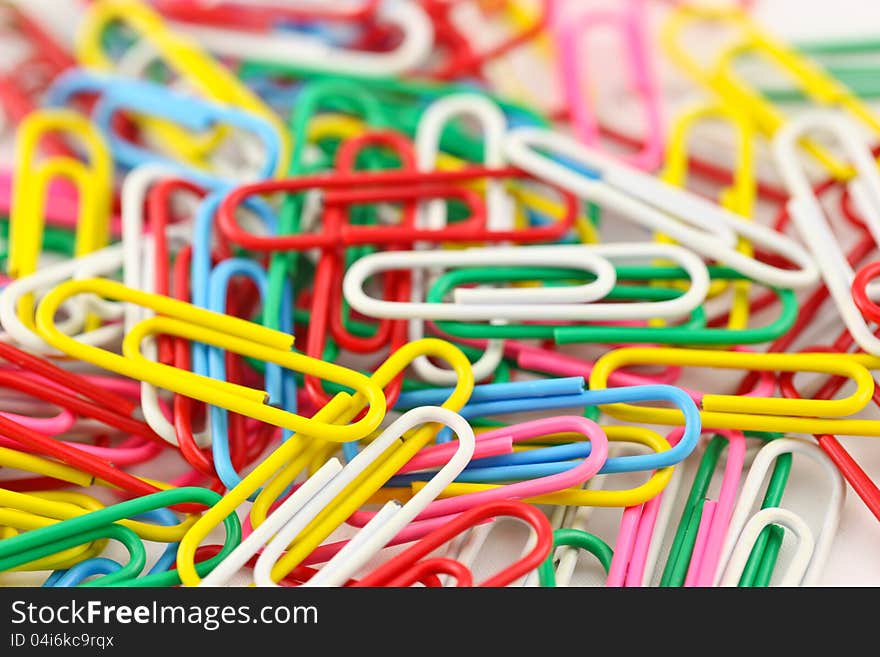 Close up colorful clips on white background