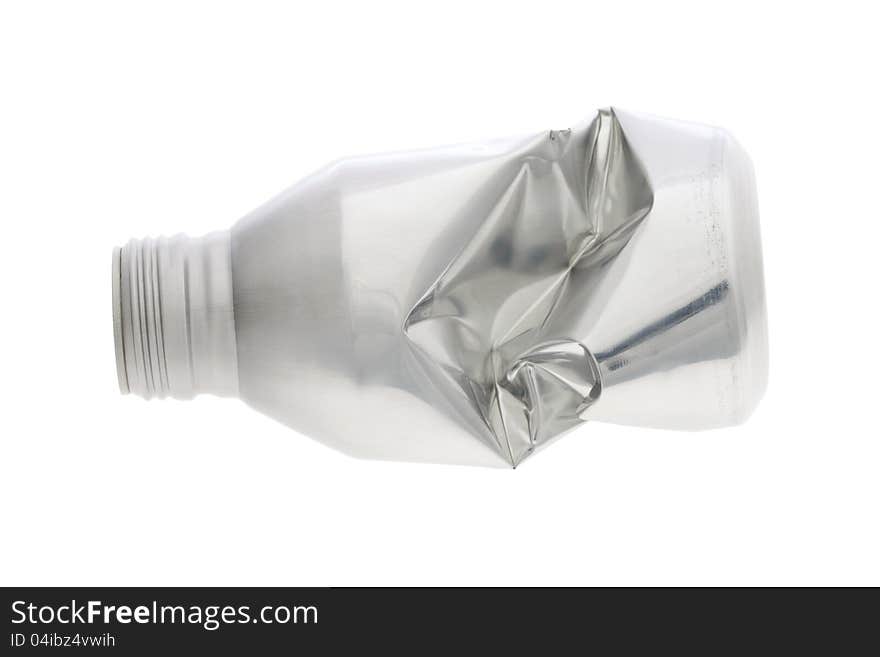 Crumpled aluminium bottle isolated on white