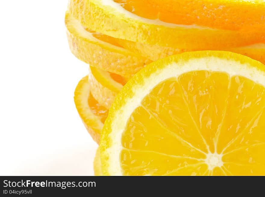 Stack of Sliced juicy fresh oranges closeup frame. Stack of Sliced juicy fresh oranges closeup frame