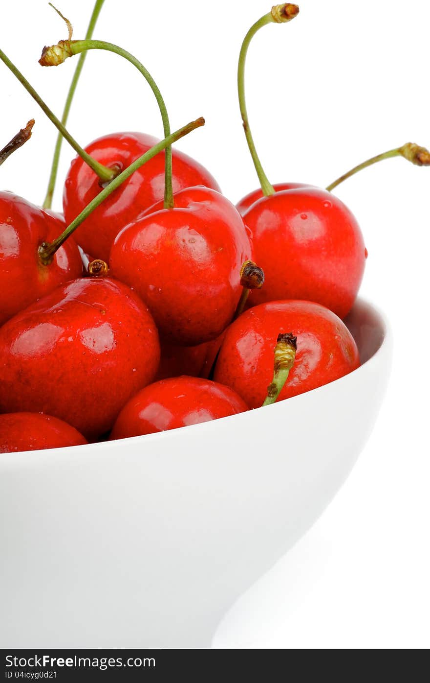 Fresh Ripe Cherry in white bowl cut out on white background