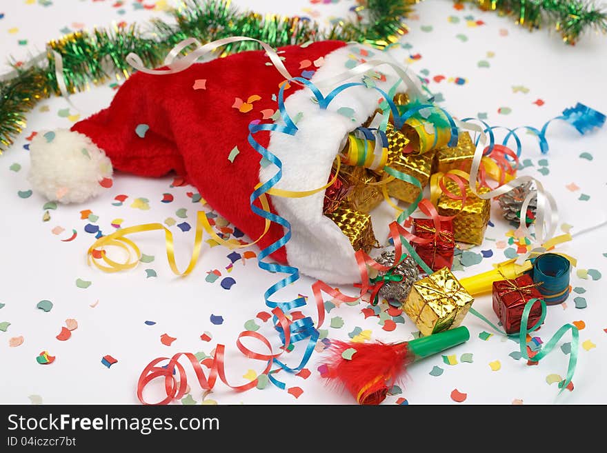 Gifts fall out of santa hats. Gifts fall out of santa hats