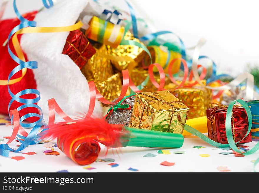 Gifts fall out of santa hats. Gifts fall out of santa hats