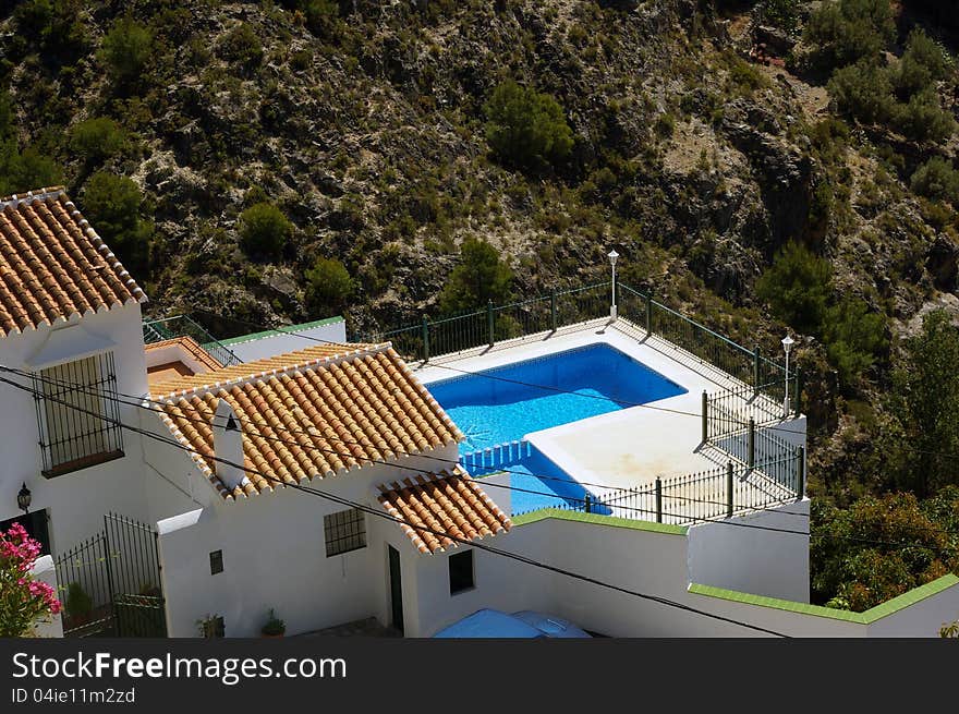 Summer style villa home with swimming pool and landscape view in Andalusia, Spain. Summer style villa home with swimming pool and landscape view in Andalusia, Spain.