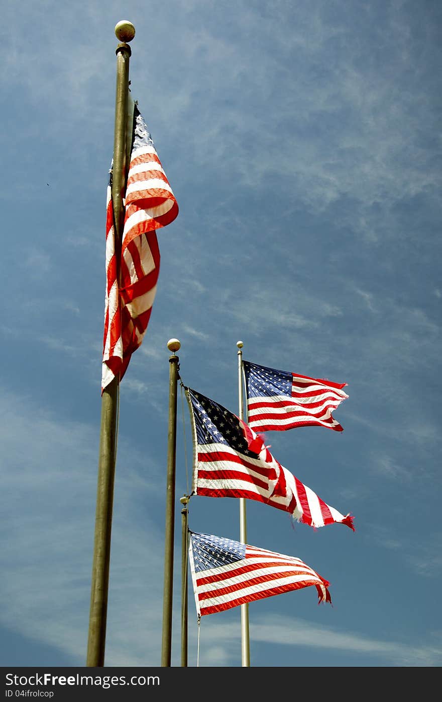 Flying flags in the blue sky. Flying flags in the blue sky