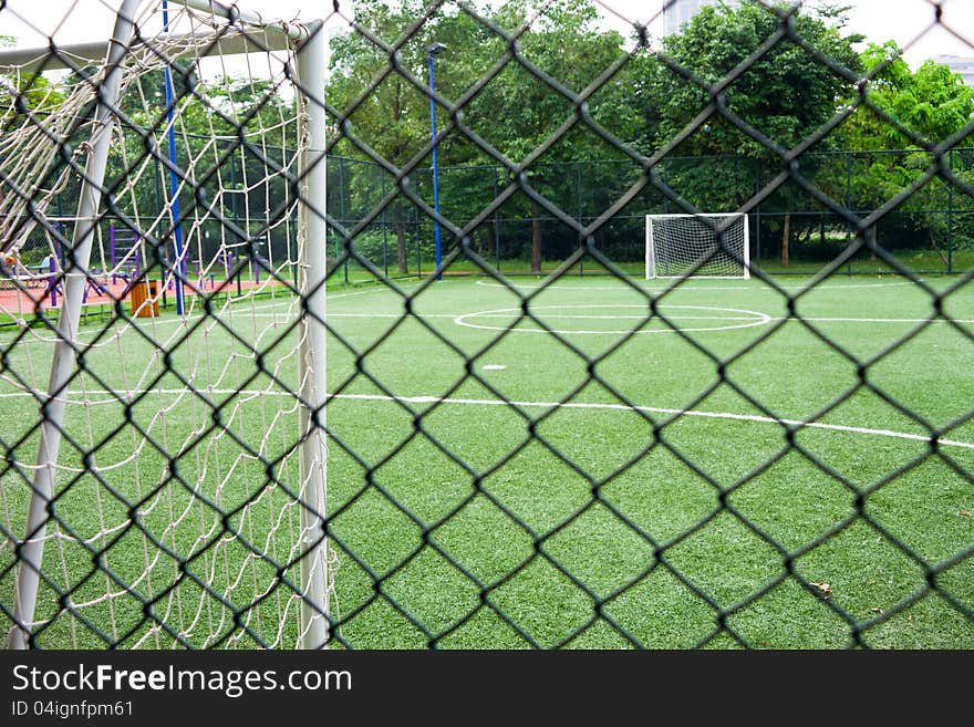 A small size and artificial turf soccer field.