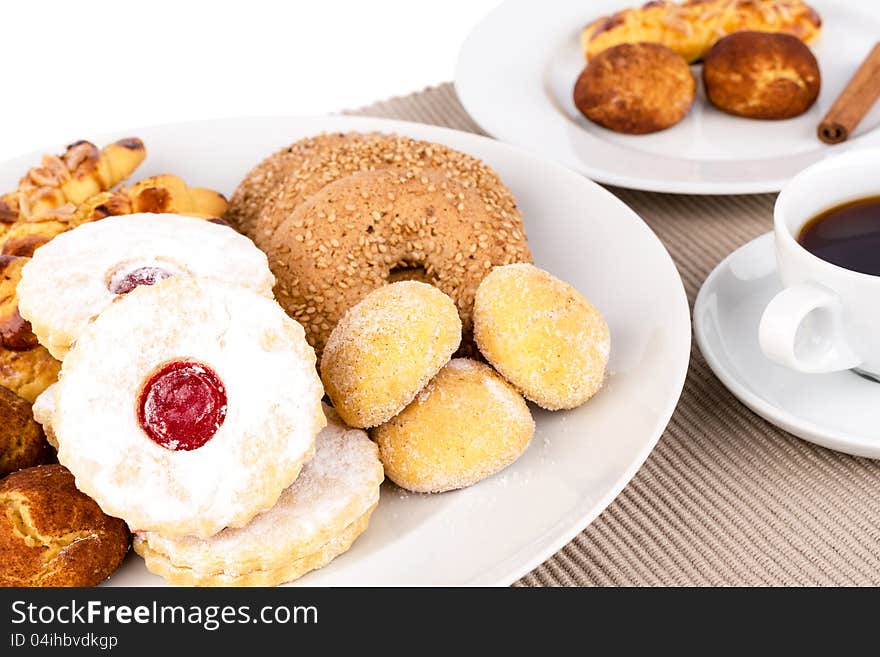 Assorted pastries and a cup of coffee. Assorted pastries and a cup of coffee.