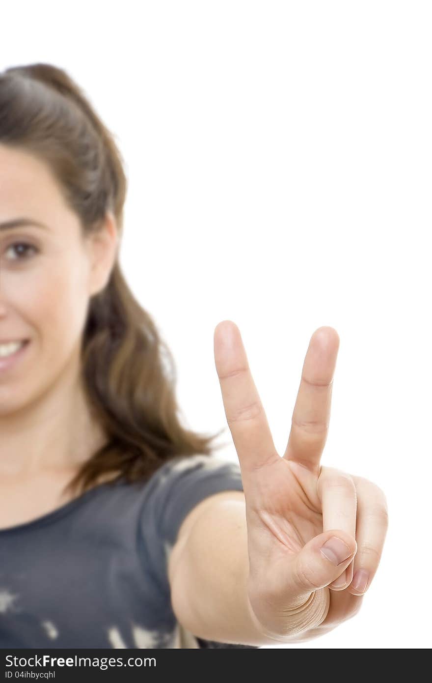 Young Woman Doing Signal Of Victory